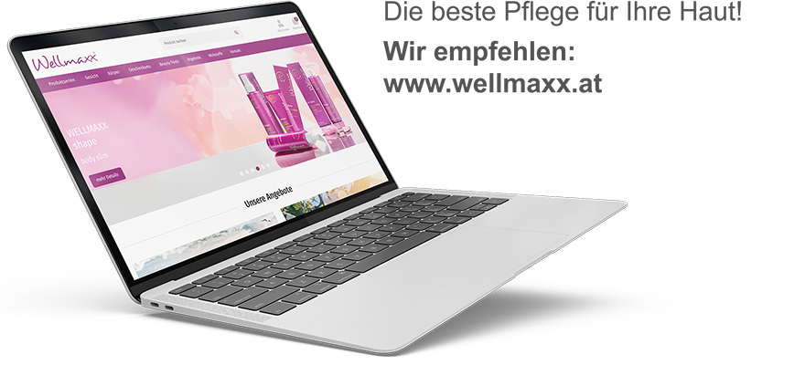 Laptop mit einem Screenshot der Website www.wellmaxx.at